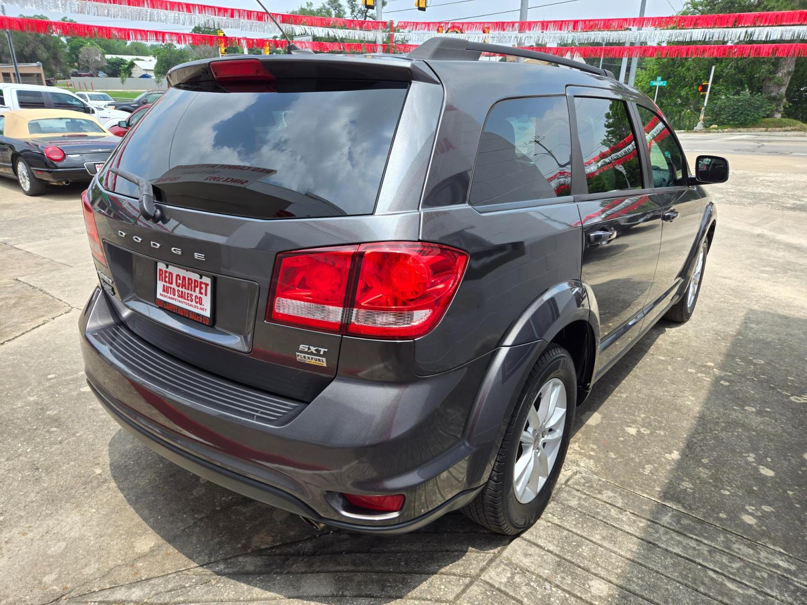 2014 GRAY Dodge Journey SXT (3C4PDCBGXET) with an 3.6L V6 DOHC 24V engine, 6-Speed Automatic transmission, located at 503 West Court, Seguin, TX, 78155, (830) 379-3373, 29.568621, -97.969803 - 2014 Dodge Journey SXT with a 3.6L V6 DOHC 24V, Automatic, Tilt, Cruise, AM/FM/CD/AUX Touchscreen Stereo, Power Windows, Locks, Seat and Side Mirrors, Tinted Windows, Third Row Seating, Dual Climate Control, Rear A/C, Backup Camera, Alloy Wheels, Rear Defroster, Rear Wiper and more!! - Photo #2